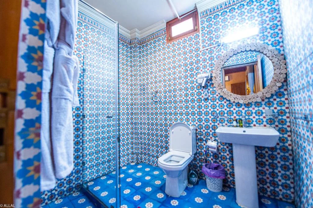 Blue zellige tiled bathroom at Riad Almonds Marrakech